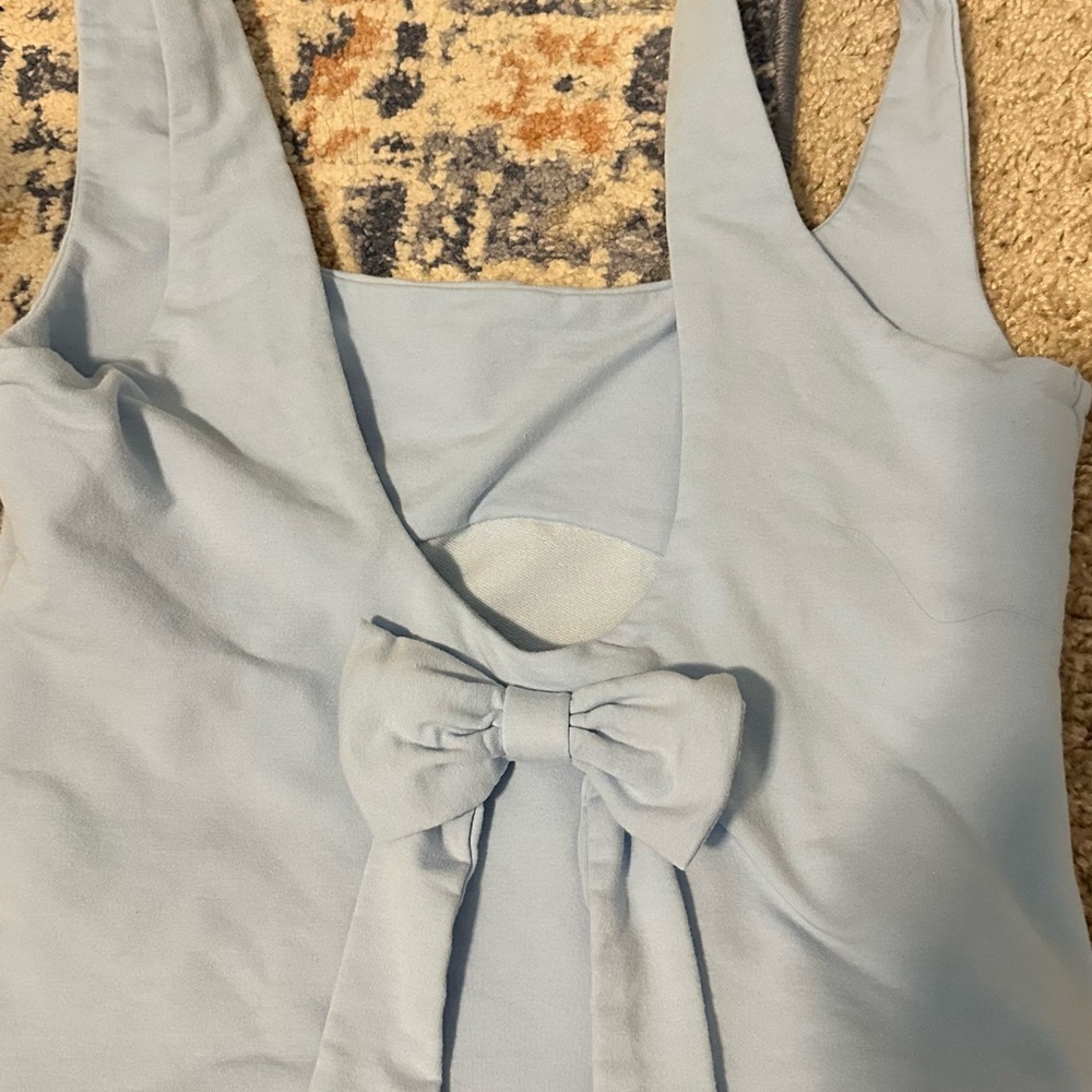 Light Blue Sleeveless Top with Bow Detail